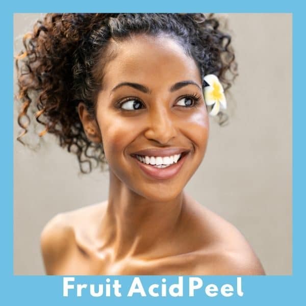 Woman smiling with clear and radiant skin after fruit Acid Peel.