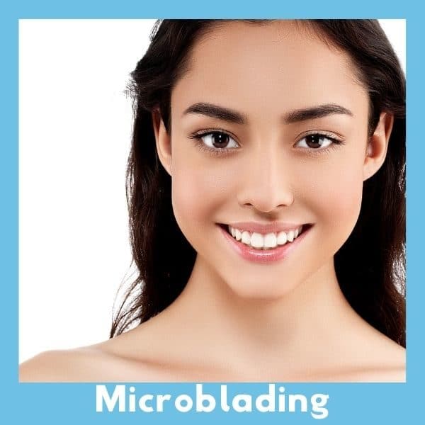 Woman smiling with clear skin after Microblading.