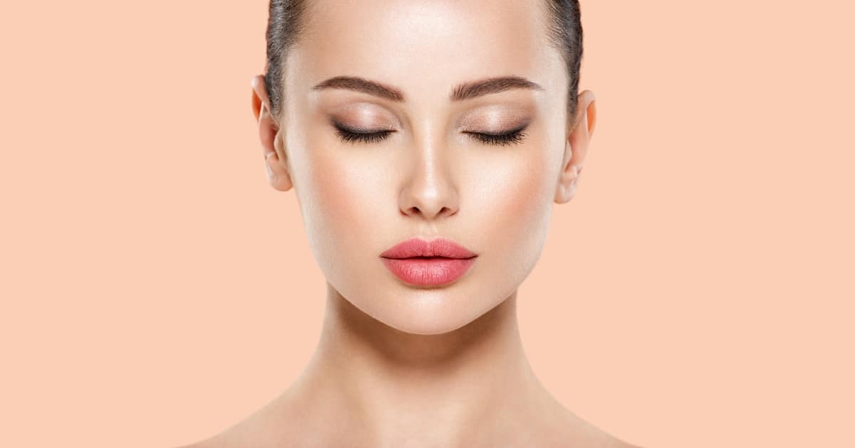 A close-up of a woman’s face with her beautiful lips.